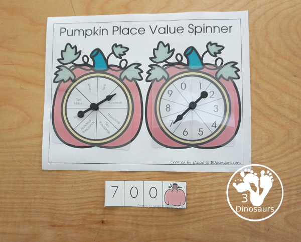 Free Pumpkin Spin & Write Place Value - You have 5 different spinners and 4 recording mats in color and black and white with place value from ones to Ones, Tens, Hundreds, Thousands, Ten Thousand, Hundred Thousands, Million, & Ten Million - 3Dinosaurs.com