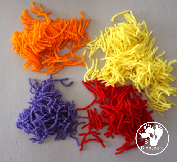 Yarn Truffula Trees - a fun and easy craft for the book The Lorax and Earth Day. You use paper, craft sticks and yarn to make the truffula trees. 3Dinosaurs.com