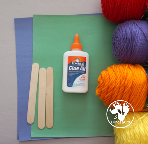 Yarn Truffula Trees - a fun and easy craft for the book The Lorax and Earth Day. You use paper, craft sticks and yarn to make the truffula trees. 3Dinosaurs.com