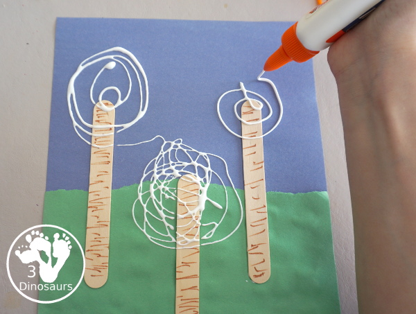 Yarn Truffula Trees - a fun and easy craft for the book The Lorax and Earth Day. You use paper, craft sticks and yarn to make the truffula trees. 3Dinosaurs.com