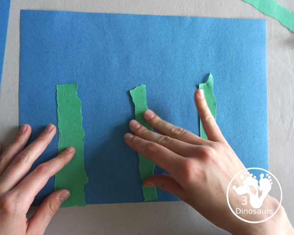 Torn Paper Flowers - a fun torn paper craft that kids can do with glue and construction paper. A simple flower craft for kids in preschool and prek. 3Dinosaurs.com