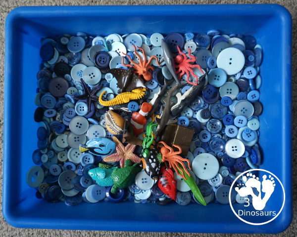 Ocean Button Sensory Bin - a simple and fun sensory bin with buttons for the filler and ocean animals, A great summer sensory bin that is easy to set up. - 3Dinosaurs.com