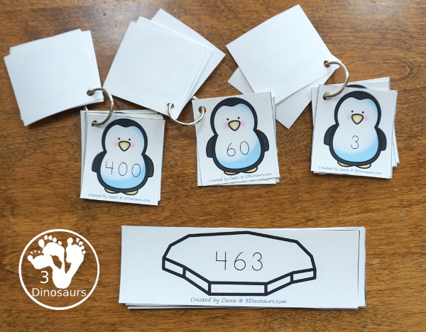 Free Penguin Place Value Matching - 2 levels of learning with place value up to hundreds for first grade and second grade learning with matching cards and recording sheets - 3Dinosaurs.com