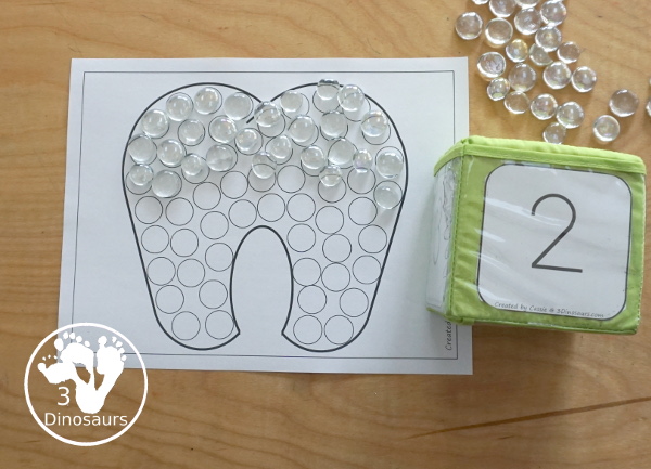 Free Tooth Fine Motor Dot Marker Printables - with four pages of printables with a tooth template to color, a tooth to trace and a dot marker tooth, all great for dental health fine motor centers. -3Dinosaurs.com