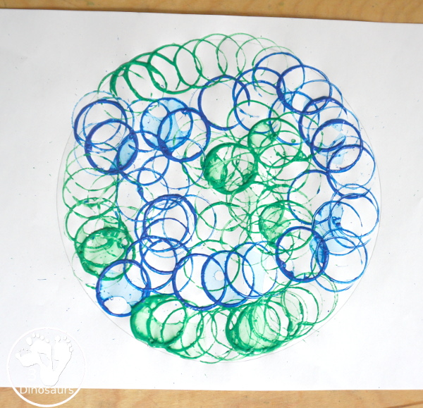 Paper Roll Painted Earth for Earth Day - fun process art projects that kids can do with paper rolls - 3Dinosaurs.com