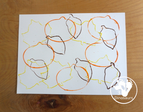 Fall Cookie Cutter Painting - with acorns, pumpkins and a leaf. Great fun theme for fall! A great painting idea for preschool and prek. 3Dinosaurs.com